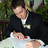 Derek Signing the Marriage Certificate