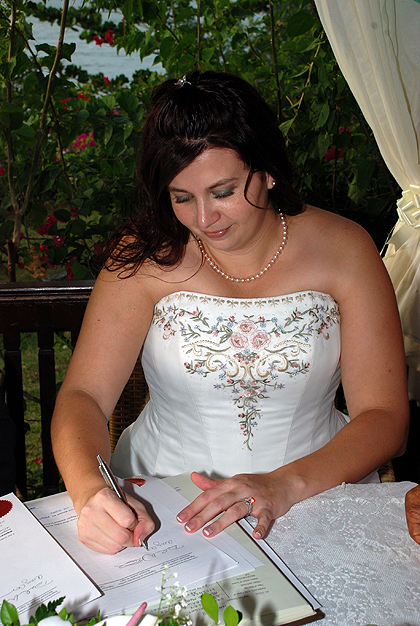 Amy Signing the Marriage Certificate