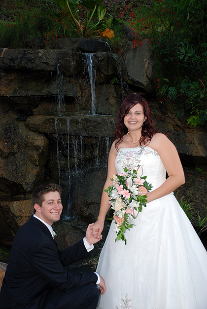 The Happy Couple Infront of the Resort